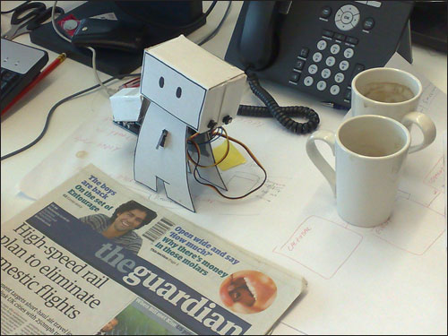 @guardianrobot at his/her desk