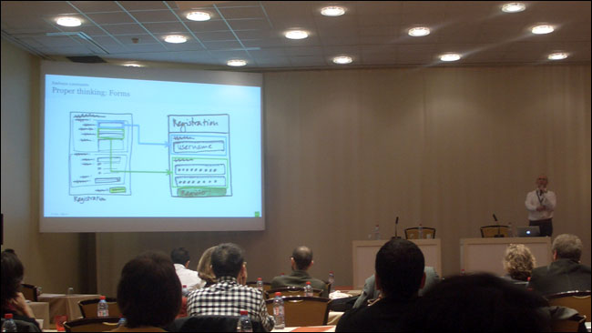 Johann Richard showing a registration form optimised for mobile at EuroIA 2010 in Paris
