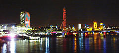 The Shell Building illuminated, alongside the London Eye and the Houses of Parliament - waiting for the fly-past down the Thames