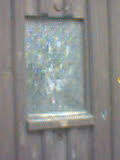 Spooky handprint on the window of the door to Sudbury Tower