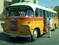 A bus boarding at Qawra's station