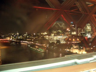 A blurry night time London seen from Tower Bridge