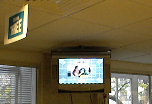 The old-fashioned girl and clown Test Card on display in Bush House