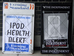 Evening Standard and The Independent billboards together - one claiming 'IPOD HEALTH SCARE', the other using the iPod in its' marketing imagery