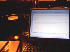 Beer and laptop, blogging at The College Arms