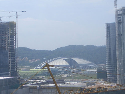 Macau sports dome flanked by casino construction