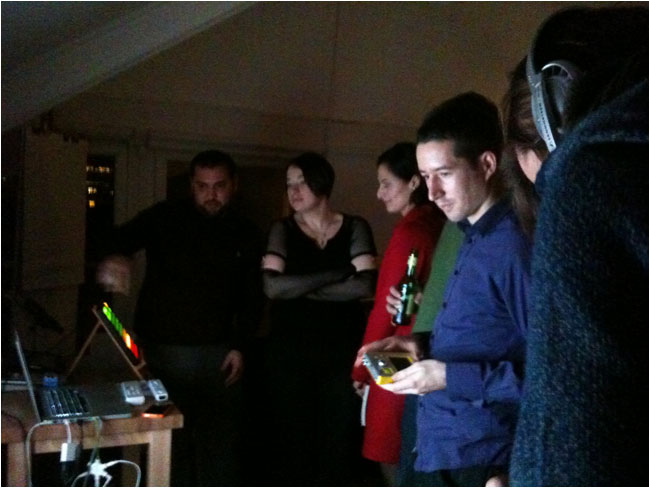 People gather to play with Jason's gadgets at London IA