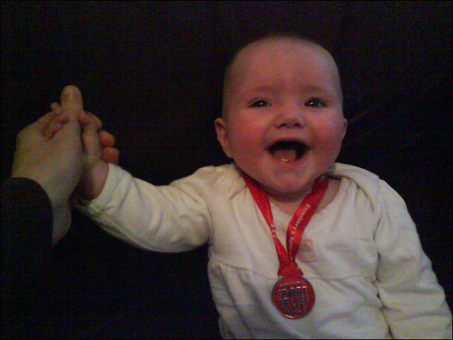 Emma with her Sport Relief medal
